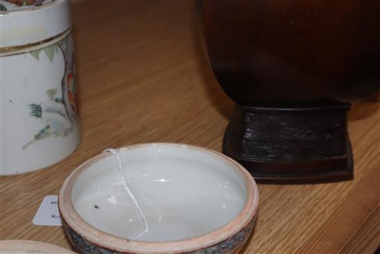 Two Chinese famille rose lidded pots and a circular pot